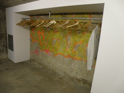 Graffiti in a  contemporary gallery, deliberately retained from the building's former use as a techno club